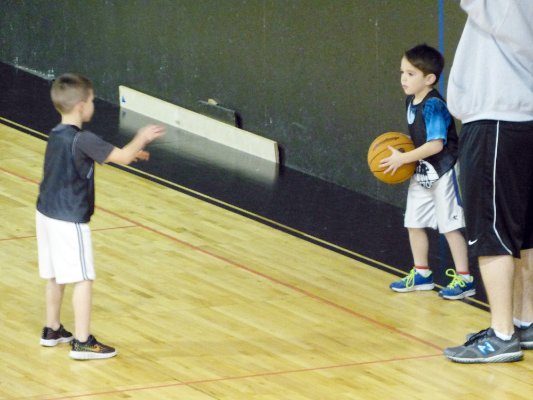 Nick throws the ball inbounds